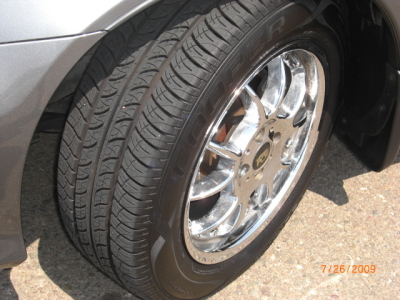 All Four Premium Tires & Chrome Rims with Mag Locks 